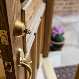 front door with key in lock