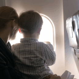 Mom and son on airplane